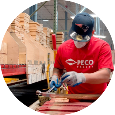 PECO worker works on pallets